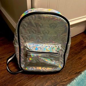 Iridescent girls back pack purse with embroidered stars and adjustable straps